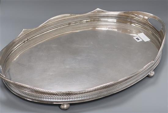 An Edwardian plated galleried tray length 66.5cm